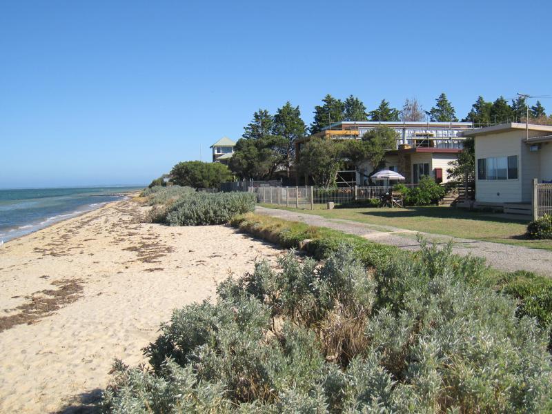 St Leonards - Yacht club and surrounding foreshore, southern end of Lower Bluff Road: View south along beach, south of yacht club