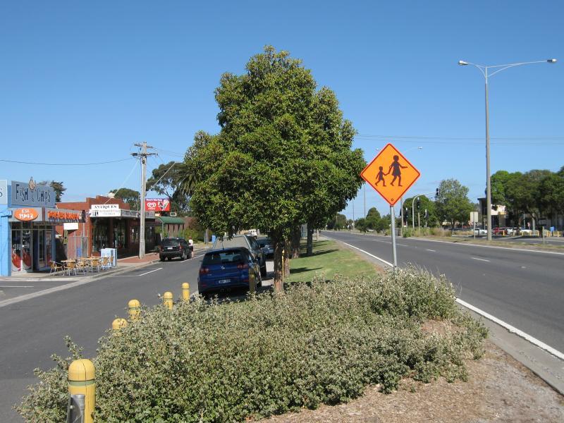 Tooradin - Shops and commercial centre, South Gippsland Highway: View east along South Gippsland Hwy towards pedestrian lights
