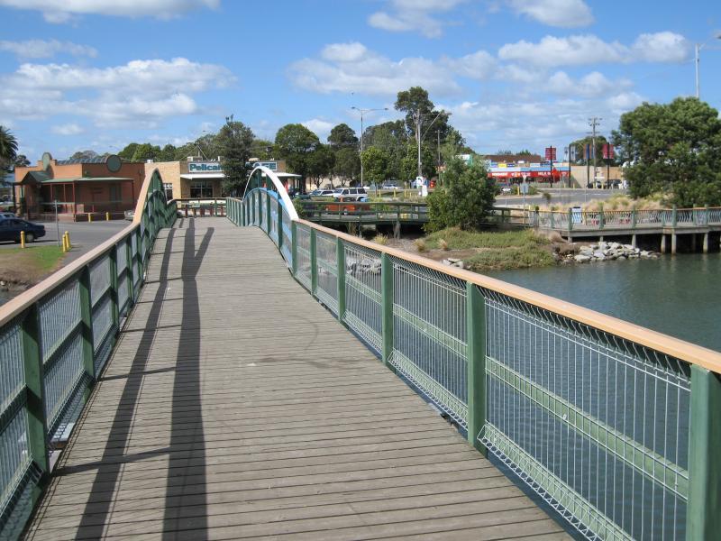 Tooradin - Sawtells Inlet north of South Gippsland Highway: View south-east along footbridge towards shops