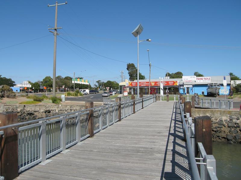 Tooradin - Sawtells Inlet and jetty, Foreshore Road: View east along footbridge towards Foreshore Rd