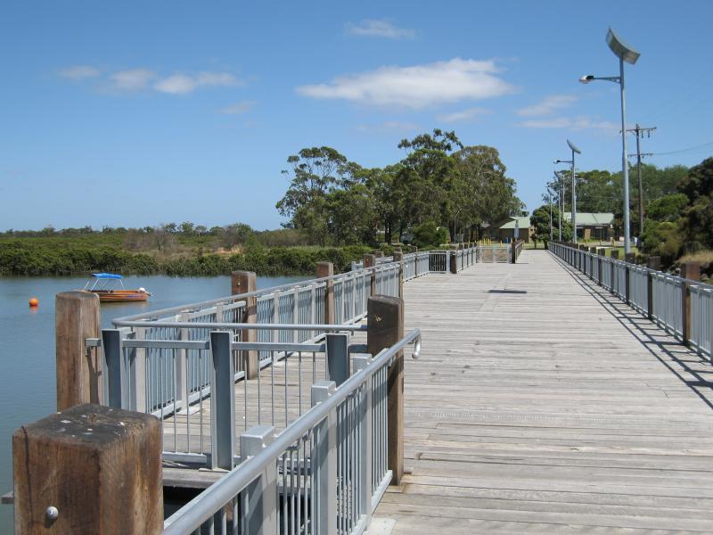 Tooradin - Sawtells Inlet and jetty, Foreshore Road: View west along footbridge across Sawtells Inlet towards hotel