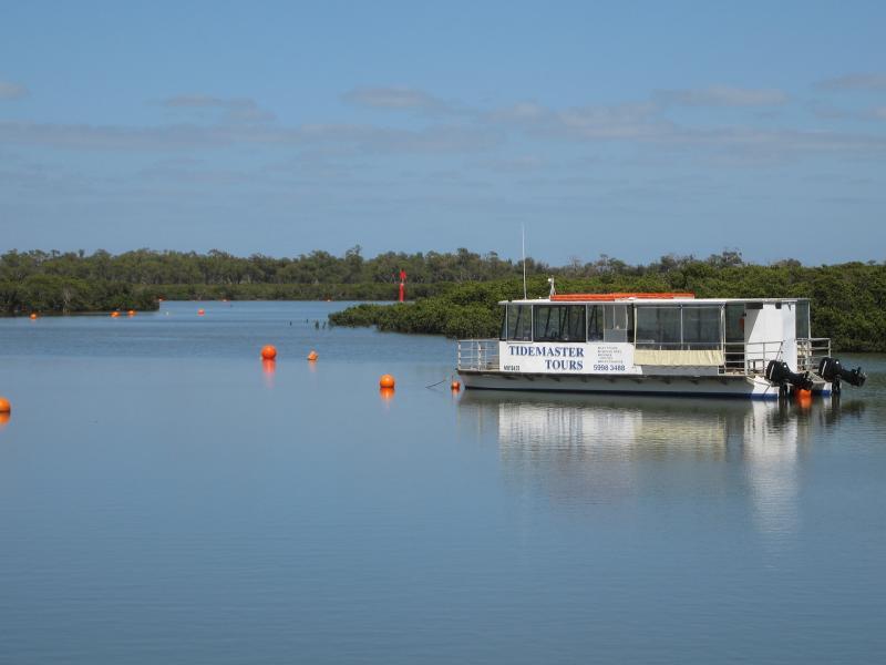 Tooradin - Sawtells Inlet and jetty, Foreshore Road: Tidemaster Tours boat, viewed from Foreshore Rd
