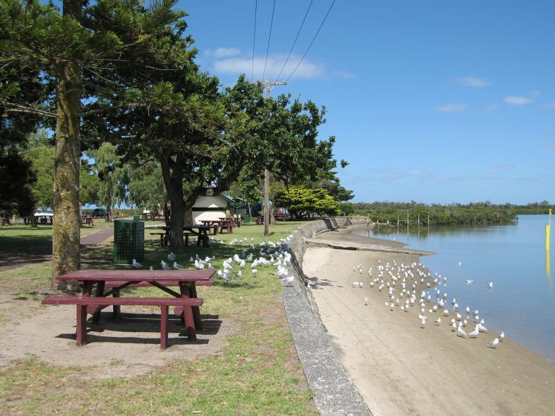 Tooradin - Landing Reserve picnic area fronting Sawtells Inlet, southern end of Foreshore Road: View south-west along foreshore through picnic area