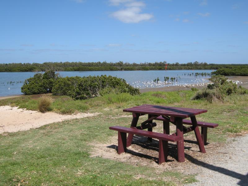 Tooradin - Landing Reserve picnic area fronting Sawtells Inlet, southern end of Foreshore Road: Westerly view across Sawtells Inlet from picnic area car park