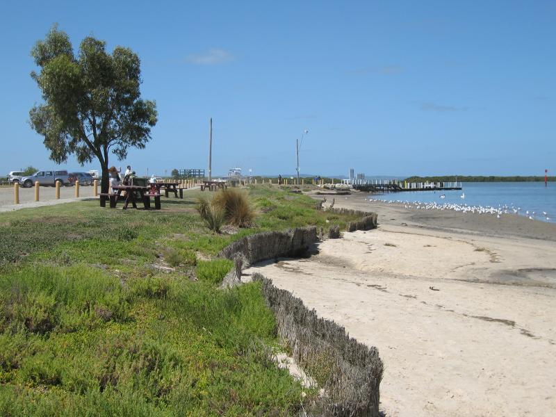 Tooradin - Boat ramp and surroundings, Sawtells Inlet south of Foreshore Road: View south along foreshore and beach towards boat ramp
