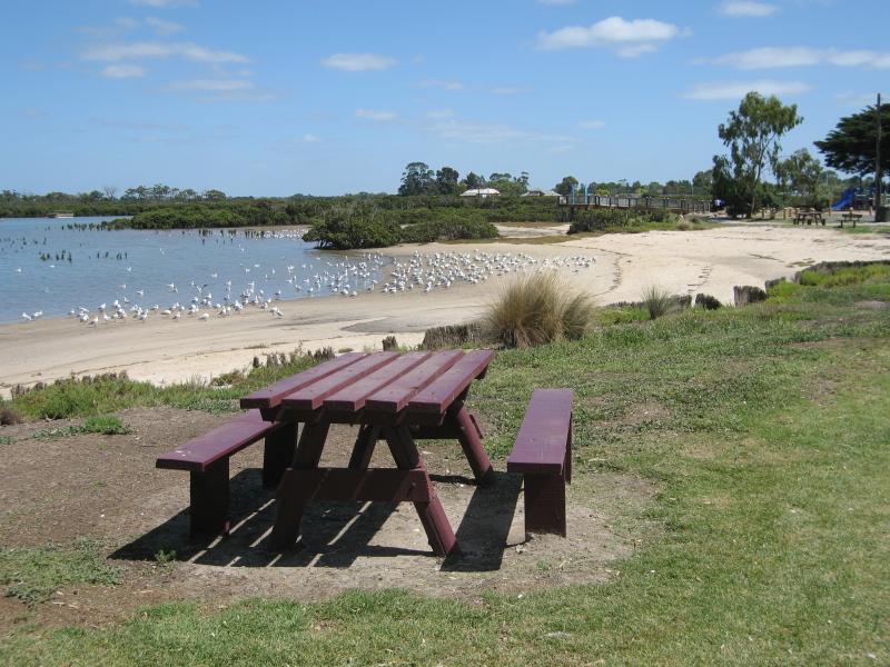 Tooradin - Boat ramp and surroundings, Sawtells Inlet south of Foreshore Road: View north along foreshore towards beach near playground