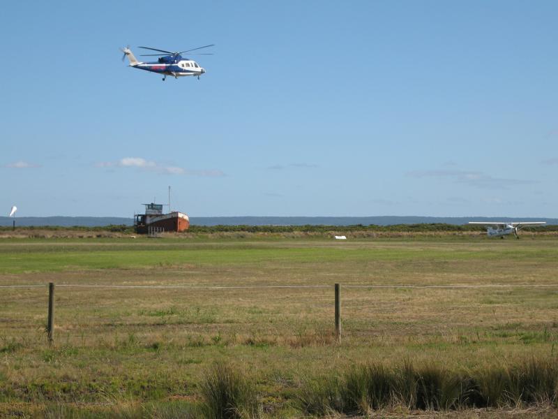 Tooradin - South Gippsland Highway east of town centre: View south across Tooradin Airfield towards coast