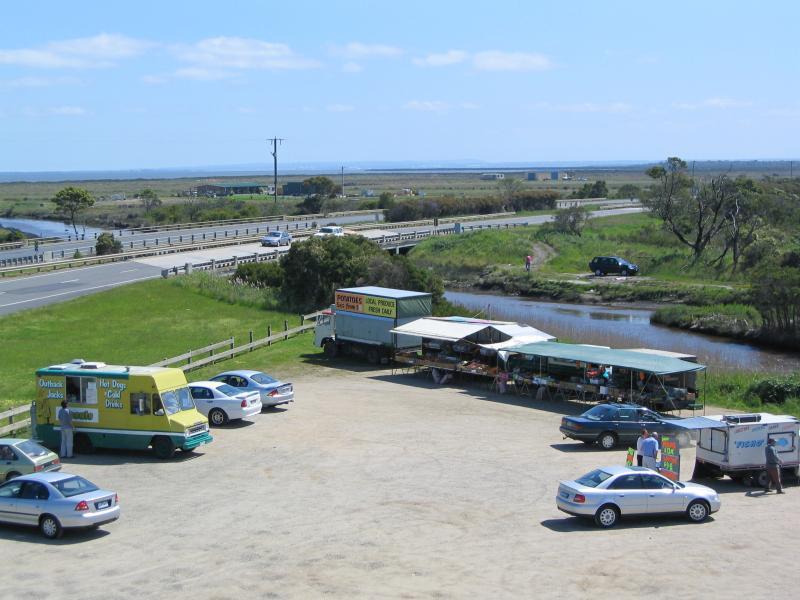 Tooradin - Roadside trading area, South Gippsland Highway at Bunyip River: View towards market stalls and Bunyip River from lookout tower