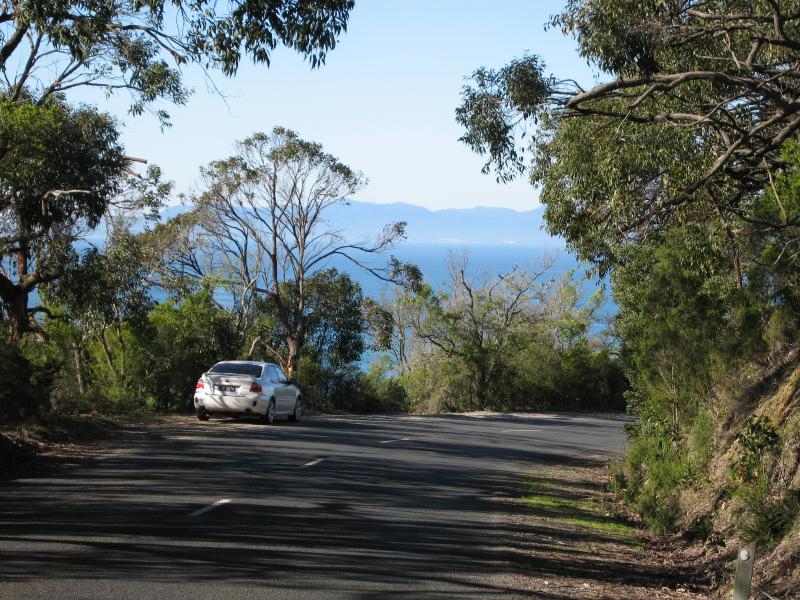 Walkerville - Bayside Drive as it descends down the coast: View east along Bayside Dr towards coast
