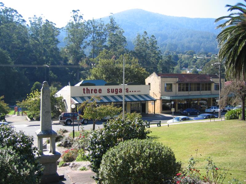 Warburton - Main Warburton commercial centre and shops: View across Warburton Hwy from reserve at memorial