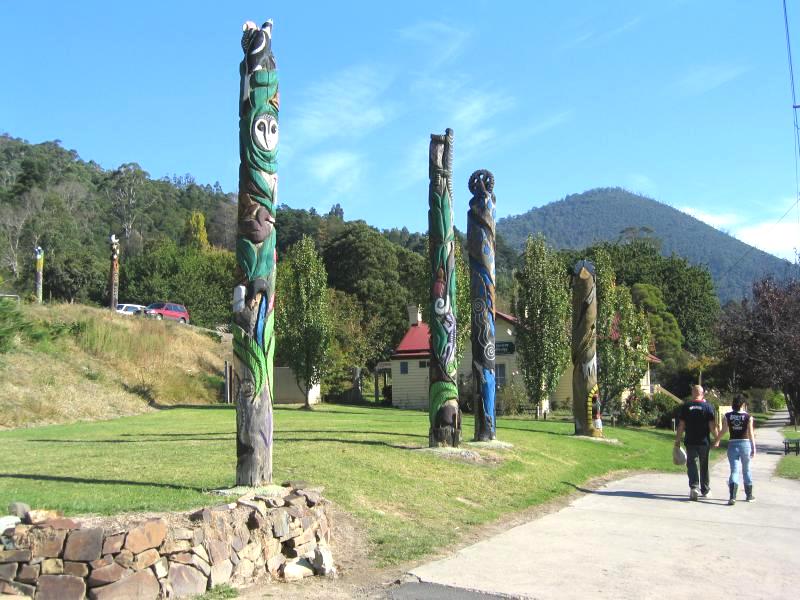 Warburton - Main Warburton commercial centre and shops: Wood carvings, view west along Warburton Hwy near memorial
