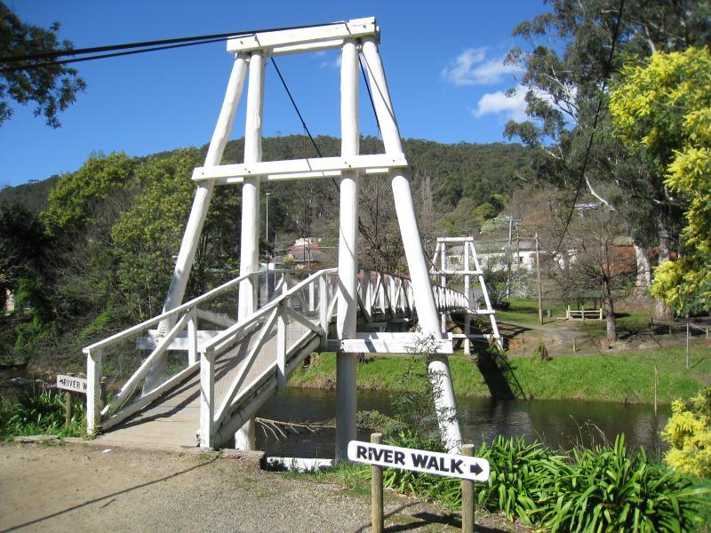 Warburton - Yarra River around Story Reserve, western end end of commercial centre: View south across Swing Bridge