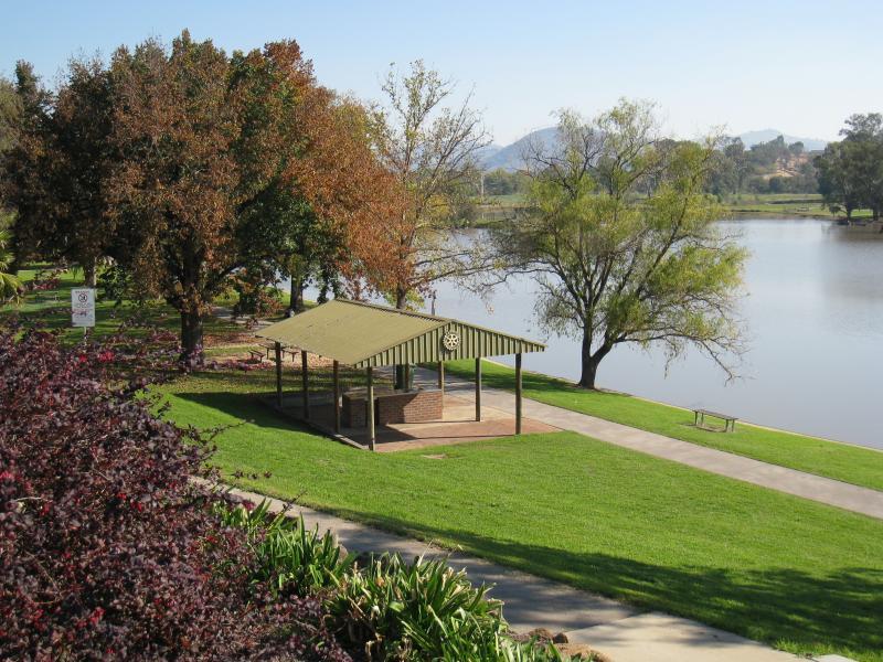 Wodonga - Sumsion Gardens: View south-west towards lake and Rotary Club BBQ shelter from slopes along east side of lake