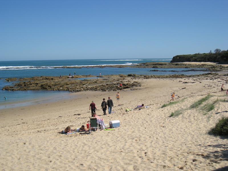 Wonthaggi - Cape Paterson, Bay Beach and boat ramp: View south-west along coast towards rock pool
