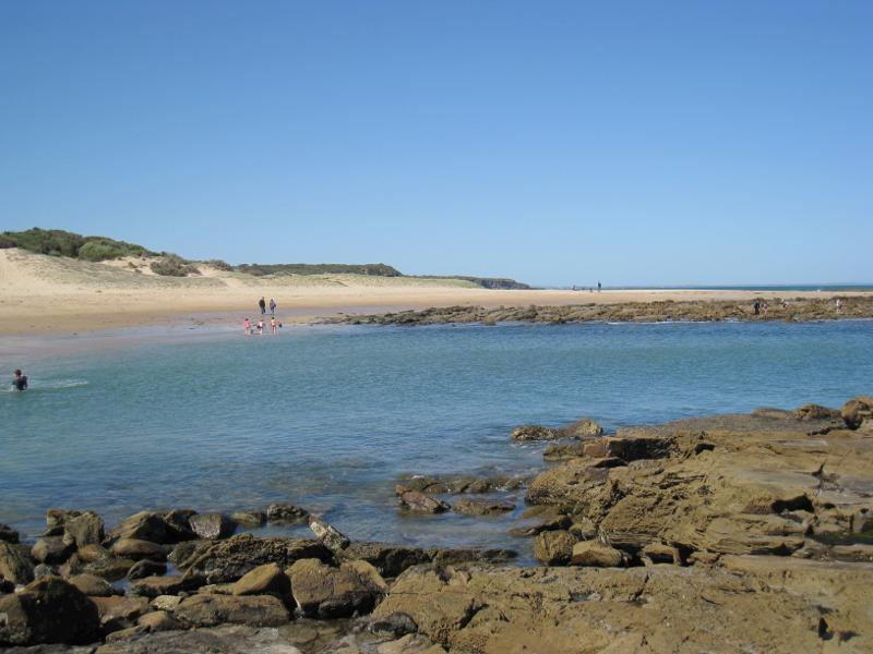 Wonthaggi - Cape Paterson, Bay Beach and boat ramp: View east towards beach from rock pool