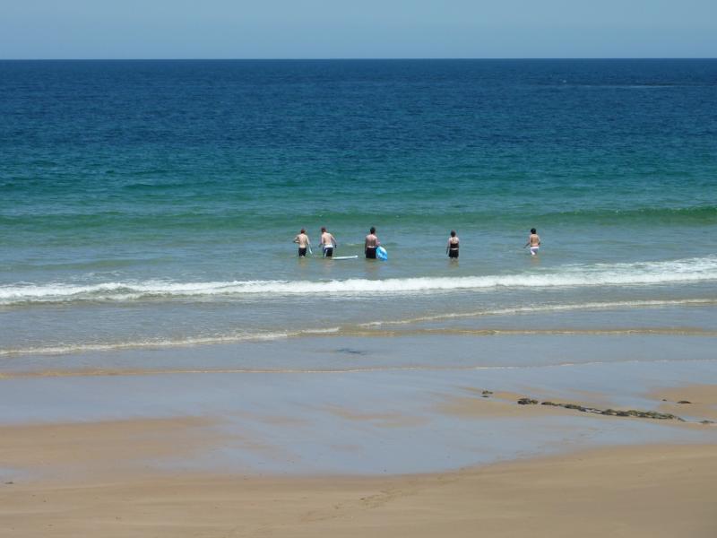 Wonthaggi - Cape Paterson, First Surf Beach near western end of Surf Beach Road: People in the water