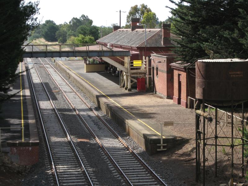 Woodend - Woodend railway station and surroundings: View north-west towards railway station from bridge at High St