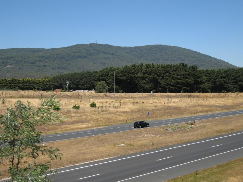 Woodend - Calder Freeway: View south-east across Calder Fwy at Lancefield Rd towards Mt Macedon