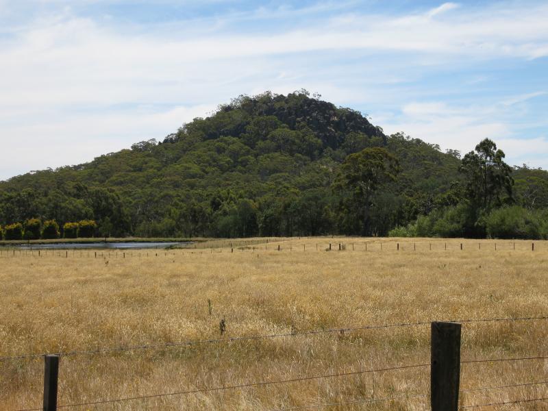 Woodend - Scenery near Hanging Rock: View north-west towards Hanging Rock from Straws La between Romsey Rd and South Rock Rd