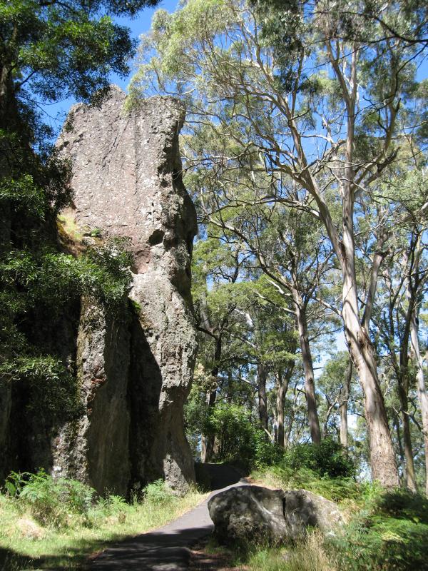 Woodend - Climb to summit of Hanging Rock: Path at base of rock approaching Morgan's Blood Waterfall