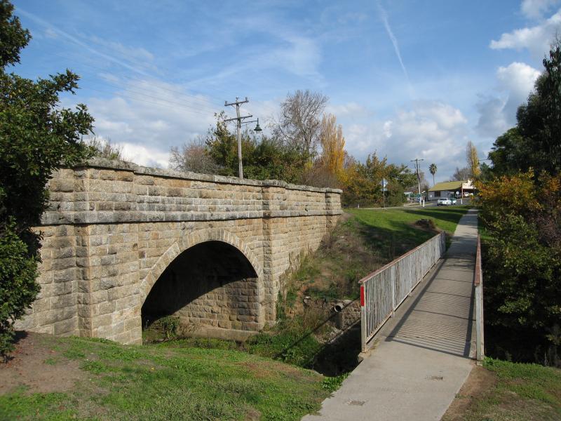 Yackandandah - Commissioners Creek and surrounding parkland: View south-west along footbridge over Commissioners Creek at Isaacs Av