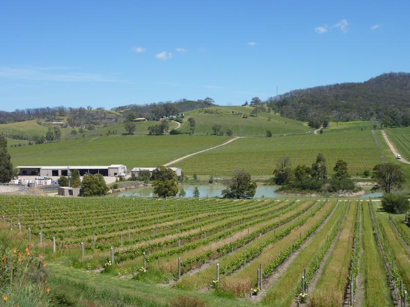 Yarra Glen - De Bortoli Winery, Pinnacle Lane, Dixons Creek: South-westerly view from car park towards vineyard, dam and work sheds