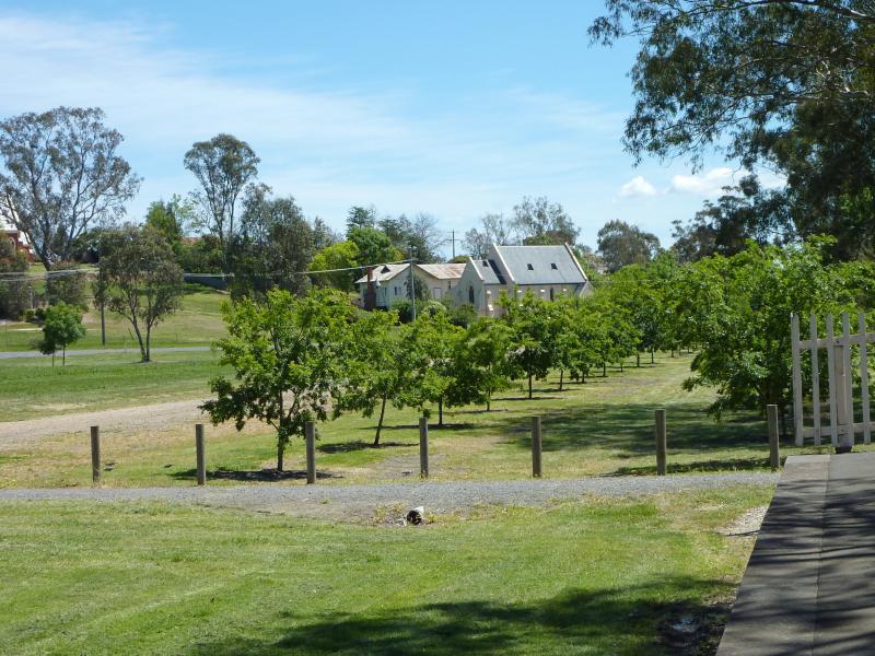 Yea - Former Yea railway station and surrounding parkland - View north-west along former railway line from station platform